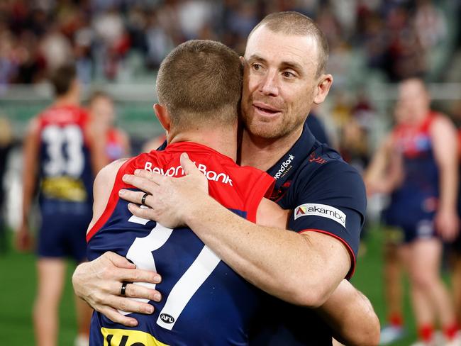 MELBOURNE, AUSTRALIA - APRIL 24: Kade Chandler of the Demons and Simon Goodwin, Senior Coach of the Demons celebrate during the 2025 AFL Round 07 match between the Melbourne Demons and the Richmond Tigers at the Melbourne Cricket Ground on April 24, 2025 in Melbourne, Australia. (Photo by Michael Willson/AFL Photos via Getty Images)