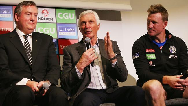 Magpies president Eddie McGuire, former head coach Mick Malthouse and current head coach Nathan Buckley pay tribute to retiring Dane Swan Picture: Getty Images