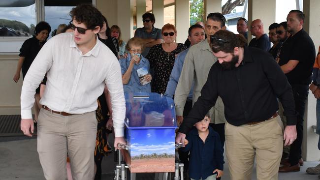 The casket of Hinchinbrook computer businessman Angelo Cosenza is carried from St Patrick’s Church following an emotional funeral service in Ingham to Pink Floyd’s ‘Shine on You Crazy Diamond’. Picture: Cameron Bates