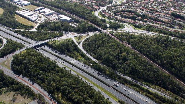 The Smith Street overpass — from the right of the picture is Arundel, to the left the start of the Pacific Pines estate.