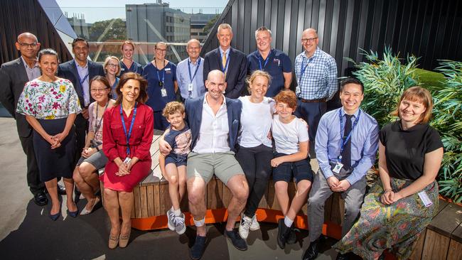 Prof Ben Solomon, Dr Anand Murugasu, Gemma Casement, Carly Battison, Katie King, Prof Geoffrey Hebbard, Prof David Russell, Dr Simon Iles, Associate Prof Chris MacIsaac, Dr Grace Chazan, Dr Hui-Li Wong, Ahida Batrouney, Dr Andrew Trinh and Dr Danielle Forbes with Chris Farrington, joined by with wife Kathryn and sons Tom, 6, and Miles, 9. Picture: Mark Stewart