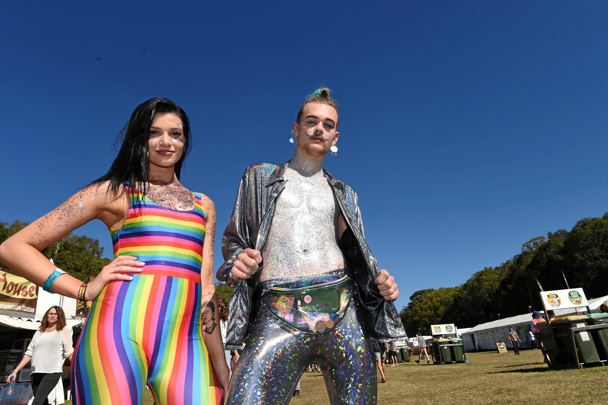 Courtney Smoulden and Dylan Barker sporting some of the extensive glitter available at Splendour in the Grass 2017 near Byron Bay. Picture: Marc Stapelberg