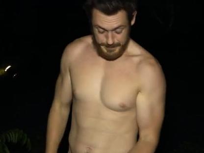 Survivor contestant Harry surveys his weight loss.