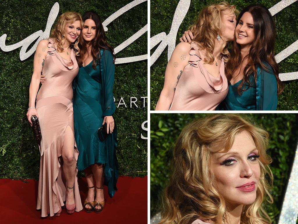 Singer Courtney Love kisses Lana Del Ray upon arrival at The British Fashion Awards 2014, in London, Monday, Dec. 1, 2014. Picture: AP