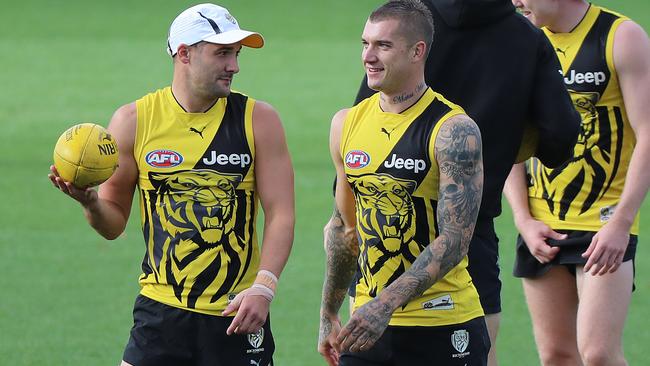 Shaun Grigg chats to Dustin Martin at Richmond training. Picture: Alex Coppel