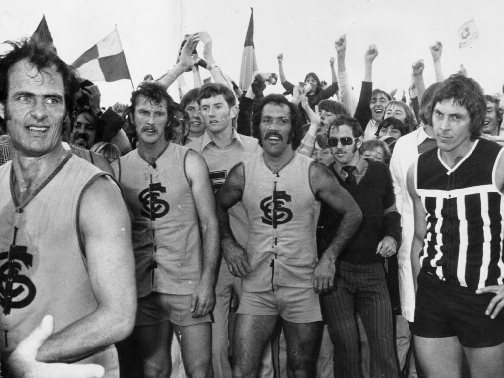 Graham stands alongside Port Adelaide’s Russell Ebert after Sturt’s win in the 1976 grand final.