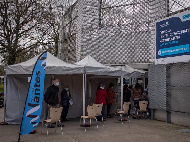 People queue outside a vaccination centre in Fance. Picture: AFP