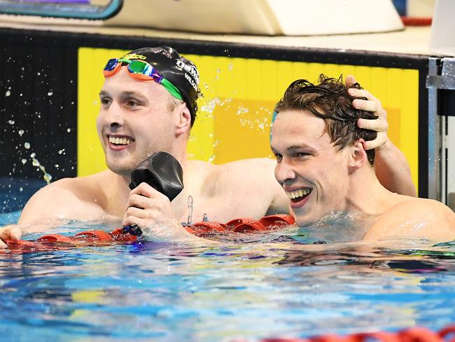 Matthew Wilson congratulates Zac Stubblety-Cook after he won the Mens 200 LC Metre Breaststroke final during day five of the 2018 Hancock Prospecting Pan Pacific Championship Trials finals at the SA Aquatic and Leisure Centre in Adelaide, Wednesday, July 4, 2018. (AAP Image/Mark Brake) NO ARCHIVING, EDITORIAL USE ONLY