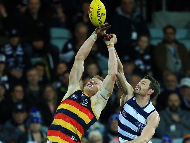 Crows ruckman Reilly O'Brien tries to mark under pressure from Geelong’s Patrick Dangerfield in last weekend’s loss to the Cats. Picture: Mark Stewart