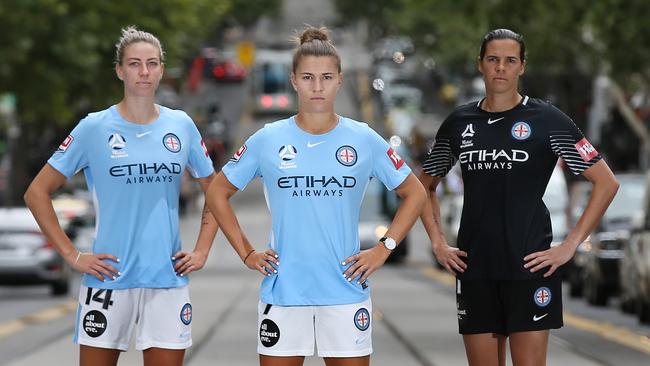 City skipper Stephanie Catley with defender Alanna Kennedy (left) and goalkeeper Lydia Williams in Collins St. Picture: Michael Klein