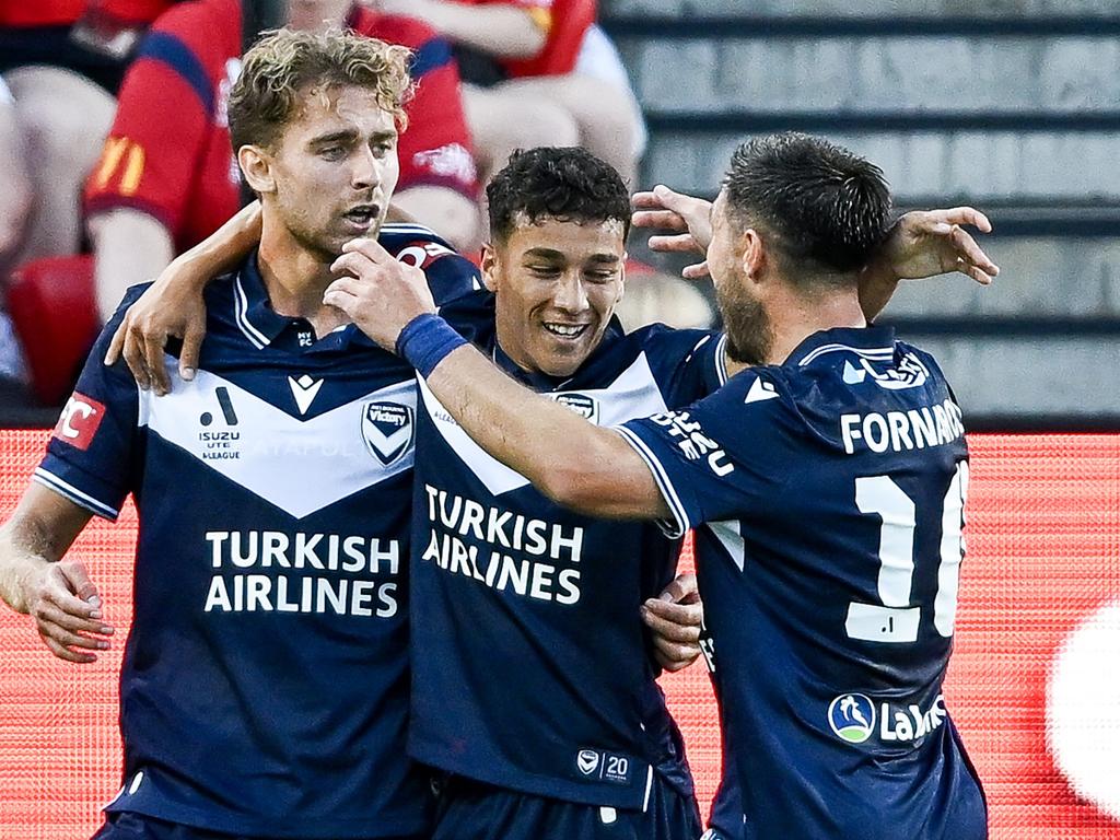 Victory players celebrate after opening the scoring. Photo: Mark Brake/Getty Images.