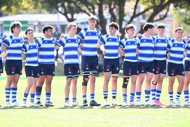 Levi Slater (third from the right with mouthguard around his ear) gets ready for a GPS First XV rugby between Nudgee College and Brisbane Grammar School last season.