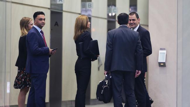 Magnis’ US managing director, Hoshi Daruwalla, left and chair Frank Poullas, right, arrive for the company’s AGM. Picture: John Feder