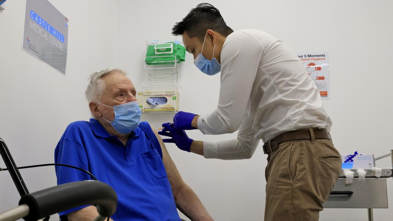 John Healy, an aged care resident, receives a COVID-19 vaccination from Dr Jesse Li at Castle Hill Medical Centre on Sunday in Sydney. Picture: Mark Evans/Getty Images