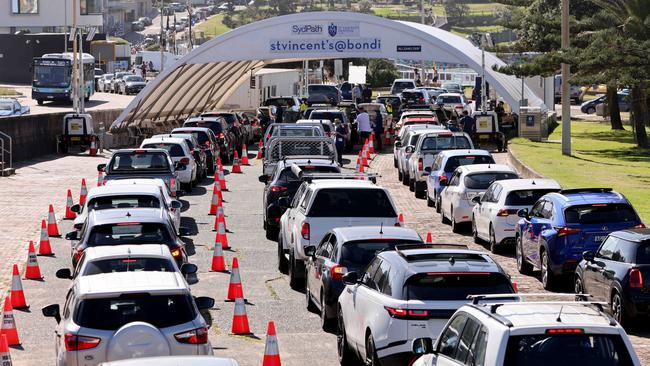 Cars queue at the Bondi Beach drive through testing site on January 2. Picture: Damian Shaw