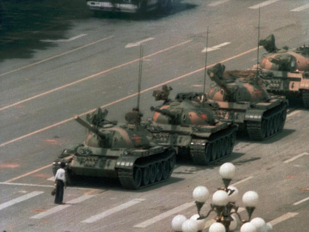 A Chinese man stands alone to block a line of tanks heading east on Beijing's Changan Blvd. in Tiananmen Square on June 5, 1989. Picture: Jeff Widener/AP