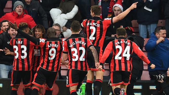 Bournemouth's Dutch defender Nathan Ake (2nd L) celebrates