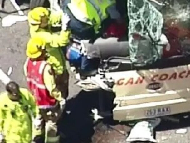 Scenes from the fatal crash at Yarrabilba which claimed the life of bus driver Peter Bohlsen.