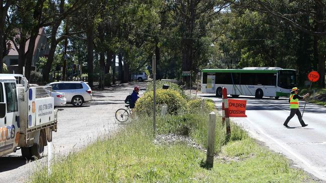 Kinglake West Primary School is calling for urgent safety upgrades to the crossing on its service road and Whittlesea-Kinglake Rd. Picture: George Salpigtidis