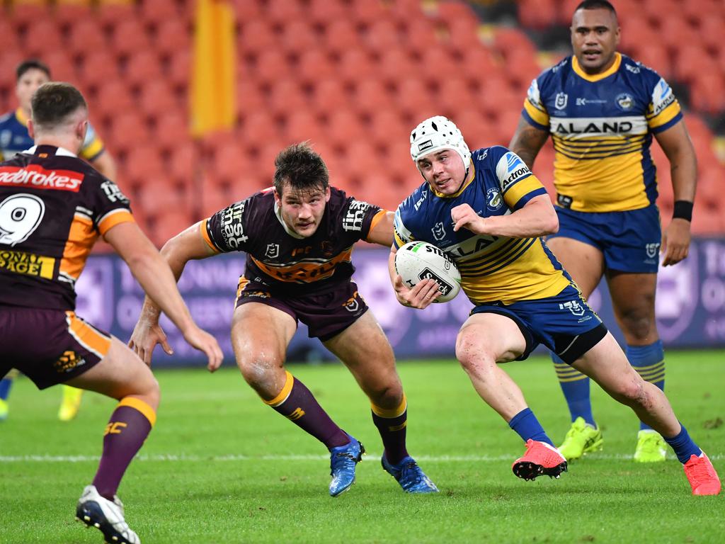 Sunshine Coast junior Reed Mahoney is runs at the Brisbane Broncos line. Photo: Darren England