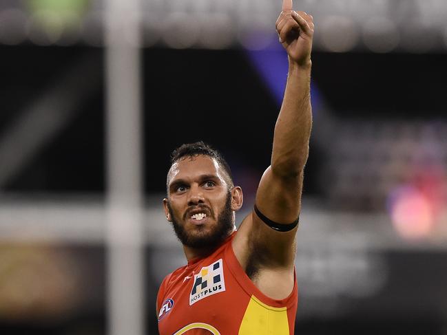 Bennell celebrates during one of his final games with the Suns in August, 2015. Picture: AAP Image/Dave Hunt.