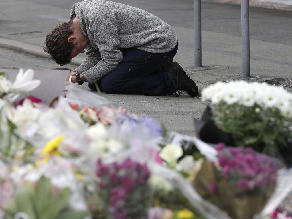 A mourner prays near the Linwood mosque in Christchurch. Picture: AP