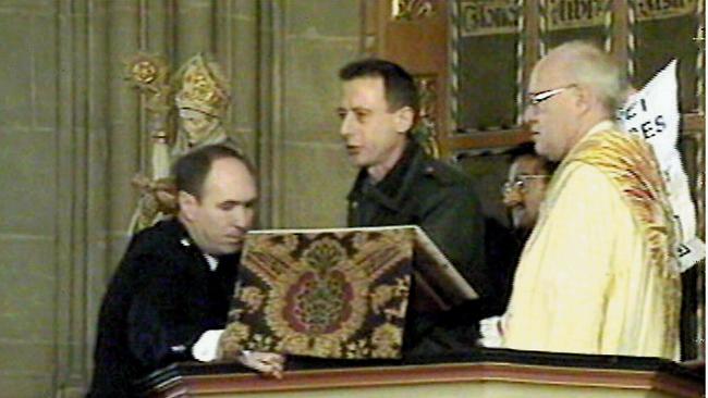 Tatchell is removed from pulpit of Canterbury Cathedral after he disrupted an Easter service in 1998.