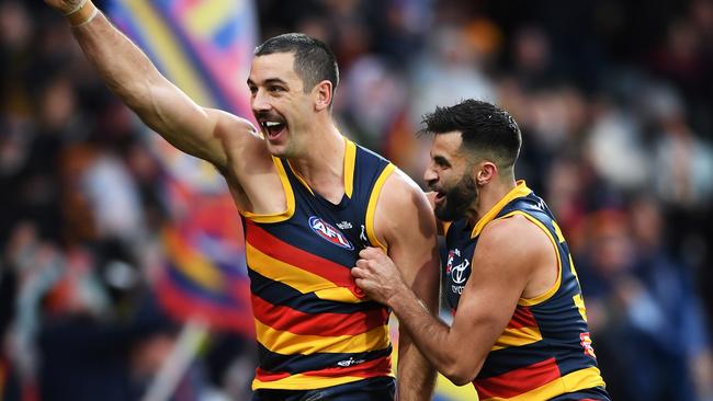 The Crows Round 18 loss to Collingwood was arguably the best game Taylor Walker (left), Darcy Fogarty and Riley Thilthorpe have played together as a collective. Picture: Getty Images.