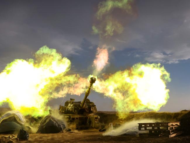 An Israeli artillery unit fires during a military drill in the annexed Golan Heights near the border with Lebanon. Picture: AFP