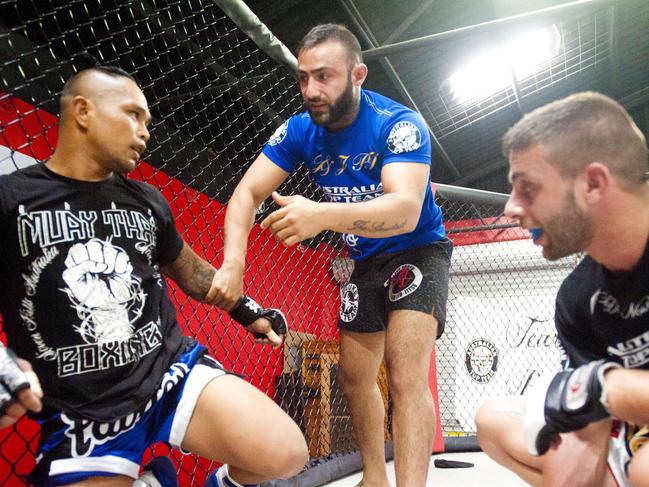 UFC trainer Ashkan Mokhtarian trains troubled kids UFC to keep them out of trouble.