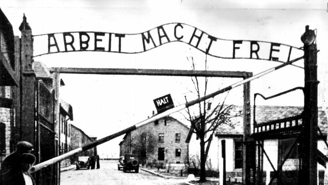 The entrance to Auschwitz concentration camp. The sign says "Work makes one free".