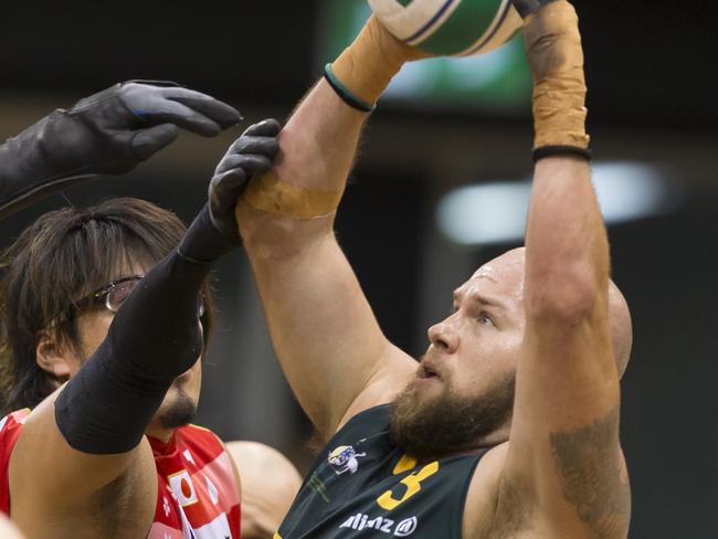 Ryley Batt of Australia the ball passes during the Gold Medal match between Australia and Japan during the GIO 2018 IWRF Wheelchair Rugby World Championships at the QuayCentre in Sydney, Friday, August 10, 2018. (AAP Image/Craig Golding) NO ARCHIVING, EDITORIAL USE ONLY