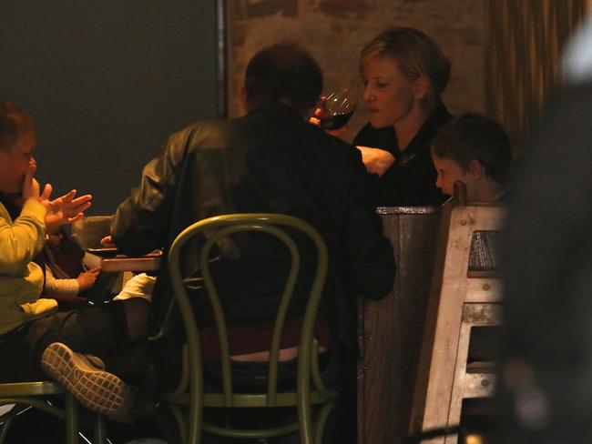 Time for lunch ... Burgers all around and a glass of red for Cate. Picture: Snapper