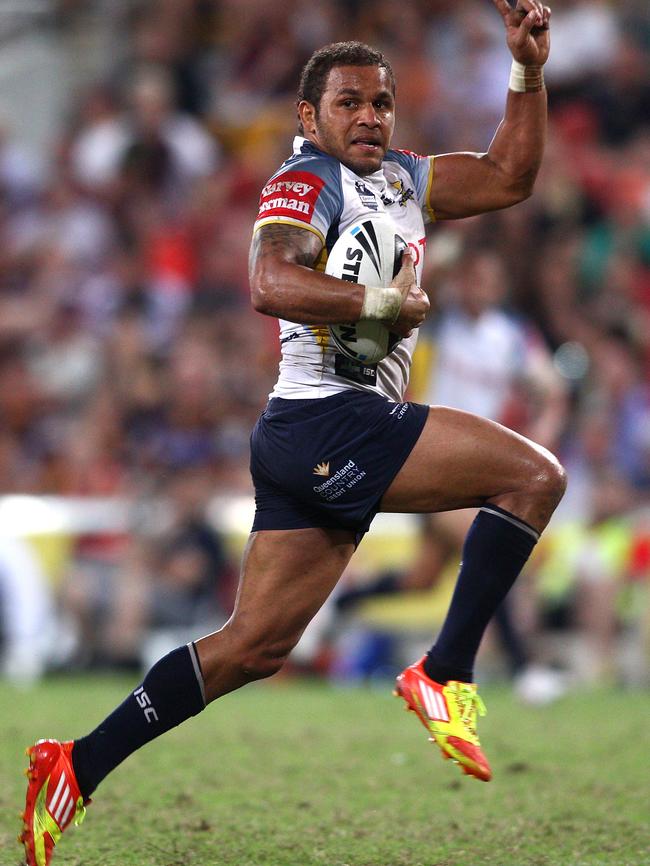 Matt Bowen celebrates as he scores the match-winning try in the final seconds of the match at Suncorp Stadium in 2012. Picture: Bradley Kanaris/Getty Images