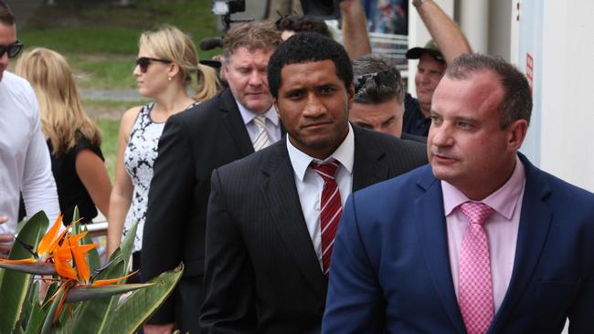 Defence lawyer Campbell MacCallum (right, front) says “the pressure is definitely there” in relation to handling the defence of Gold Coast Titans — such as Kalifa Faifai Loa — facing drugs charges   Photo: Adam Armstrong.