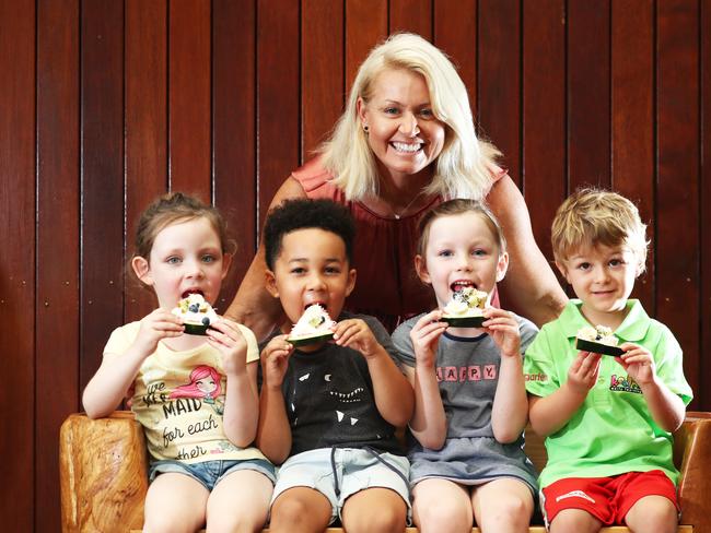 Karla Gilbert with 4 year olds (L-R) Katie Ross, Omari Mapako, Pyper Lavaring, Jaxon Miller at Kool Kids Nerang. Photograph: Jason O'Brien