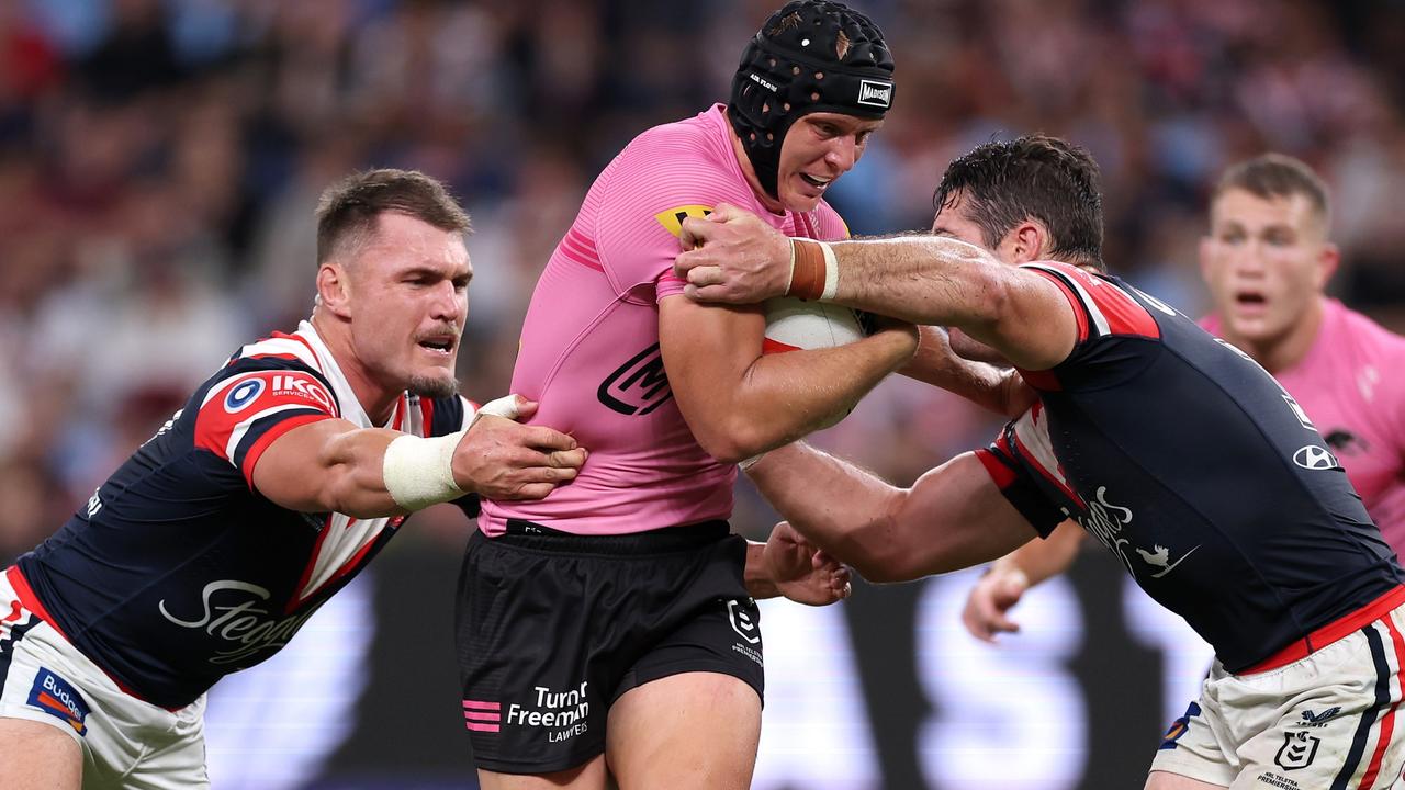 SYDNEY, AUSTRALIA - MARCH 28: Brad Schneider of the Panthers is tackled during the round four NRL match between Sydney Roosters and Penrith Panthers at Allianz Stadium on March 28, 2024, in Sydney, Australia. (Photo by Cameron Spencer/Getty Images)