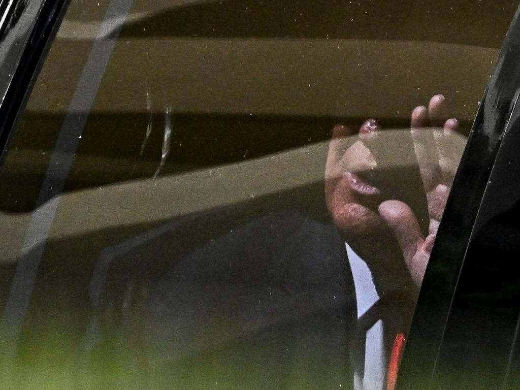 Donald Trump waves from his vehicle following his appearance at Wilkie D. Ferguson Jr. United States Federal Courthouse, in Miami, Florida. Picture: AFP