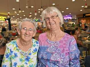 SISTERS: Booval Fair customers Mavis Cunning, 90, and Fay Vinson, 78. Picture: Cordell Richardson