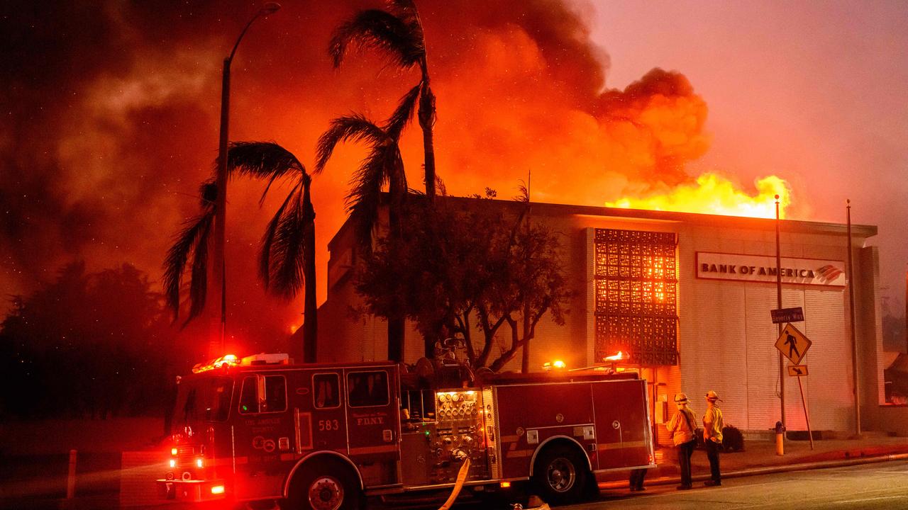 A Bank of America fully engulfed in flames along Lake Ave. during the Eaton fire in the Altadena area. Picture: Josh Edelson/AFP