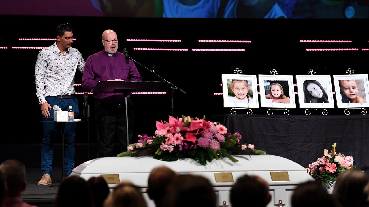 Hannah Clarke’s brother Nat and uncle Ian Adrian with the single shared coffin holding Ms Clarke and her children Aaliyah, Laianah and Trey. Picture: Dan Peled