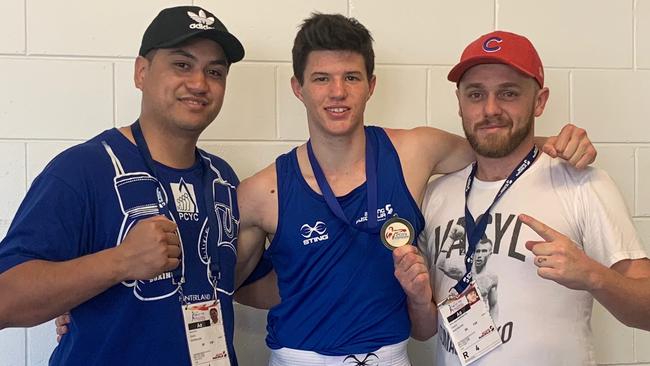 All Star Boxing Academy owner Ben Harrington with Paul Utia and Levi Langham at the Under 19 National Championships at the Gold Coast.