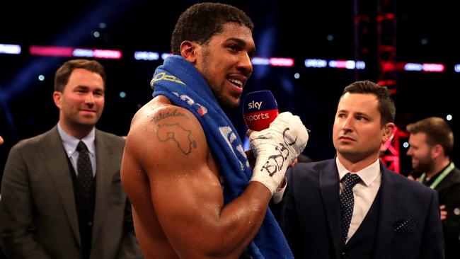 Anthony Joshua speaks to the crowd after his win.