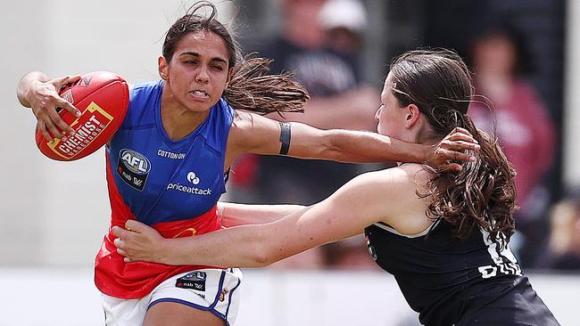 Courtney Hodder of the Brisbane Lions unsuccessfully fends off Ella Friend. Picture: Michael Klein