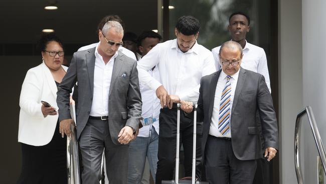 Talatau Junior Amone (middle white shirt) leaving Wollongong courthouse on Monday. Picture: NCA NewsWire / Simon Bullard.