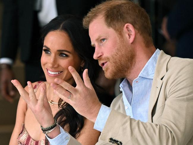 Support for Prince Harry and his wife Meghan Markle has dropped according to the survey. Picture: AFP