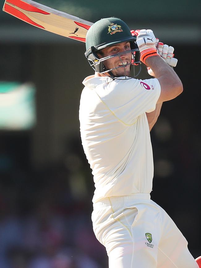 Mitchell Marsh smashes a boundary.