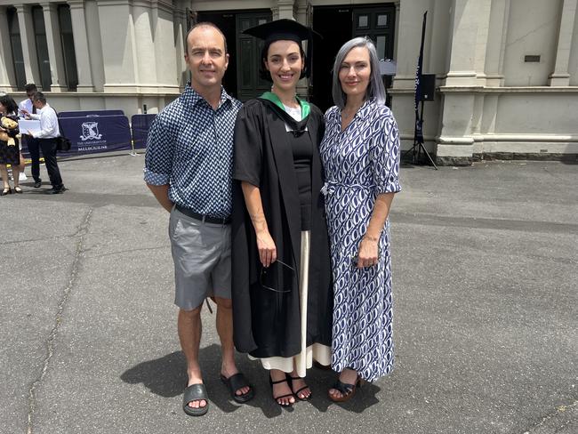 Graeme Gibbons, Grace Gibbons (Master of Education) and Darrylin Galanos at the University of Melbourne graduations held at the Royal Exhibition Building on Saturday, December 14, 2024. Picture: Jack Colantuono