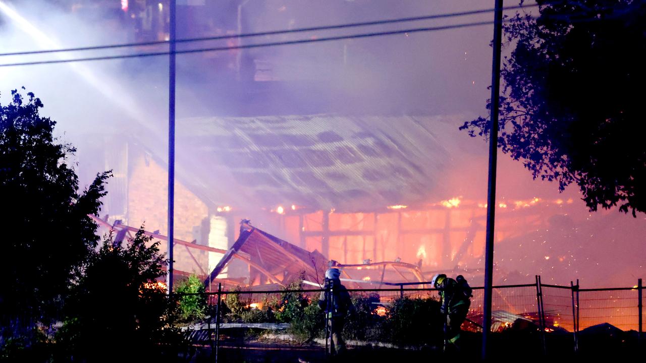 Multiple fire units spray water on buildings on fire in Hubert St, Gabba – on Wednesday 25th of September – Photo Steve Pohlner