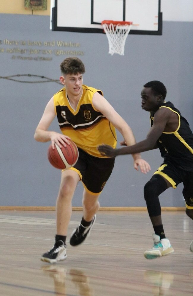 Padua and Lauries' First V basketballers in action.